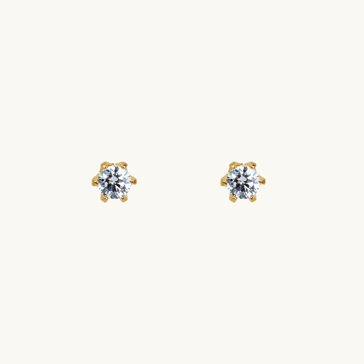 Pin rhngen i guld med vit sten, 4 mm