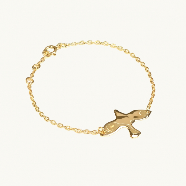ojämn duva på ett armband i guld