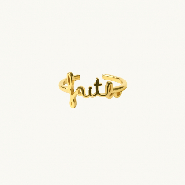 Ring i guld med ordet faith