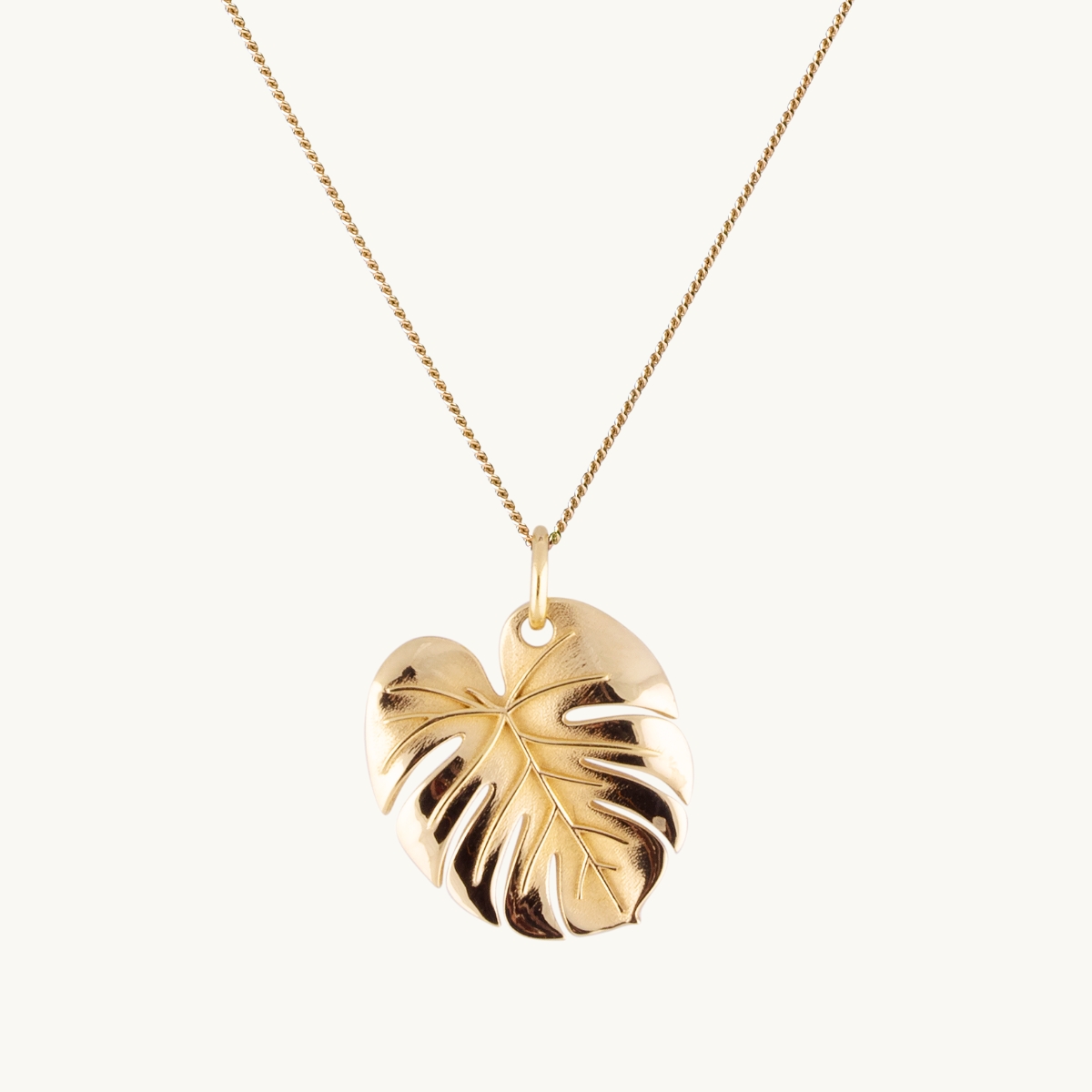Palmhalsband med guldberlock