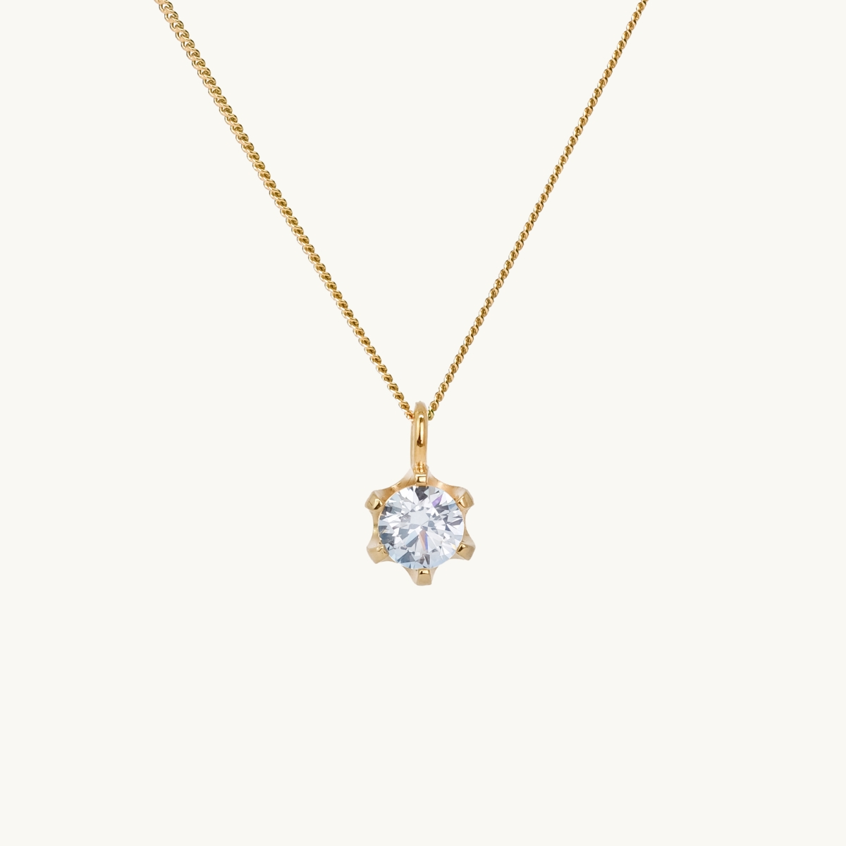 Halsband berlock guld med en vit diamant infattad i klo, prinsessa