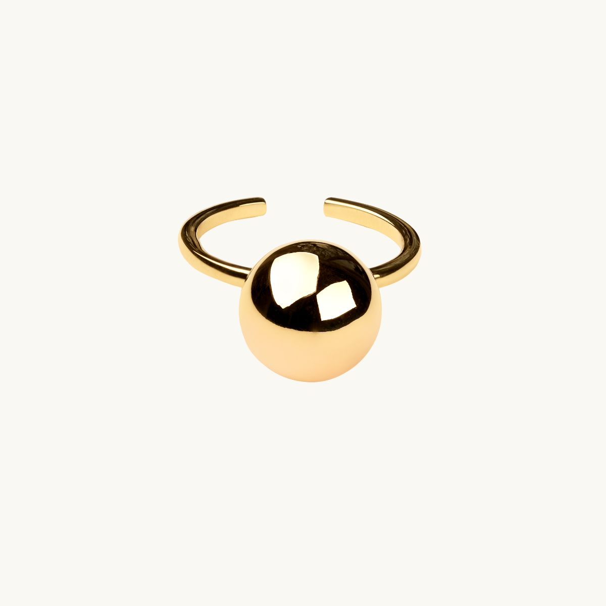 ring i guldfrgylld mssing med stor boll