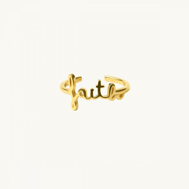 Ring i guld med ordet faith