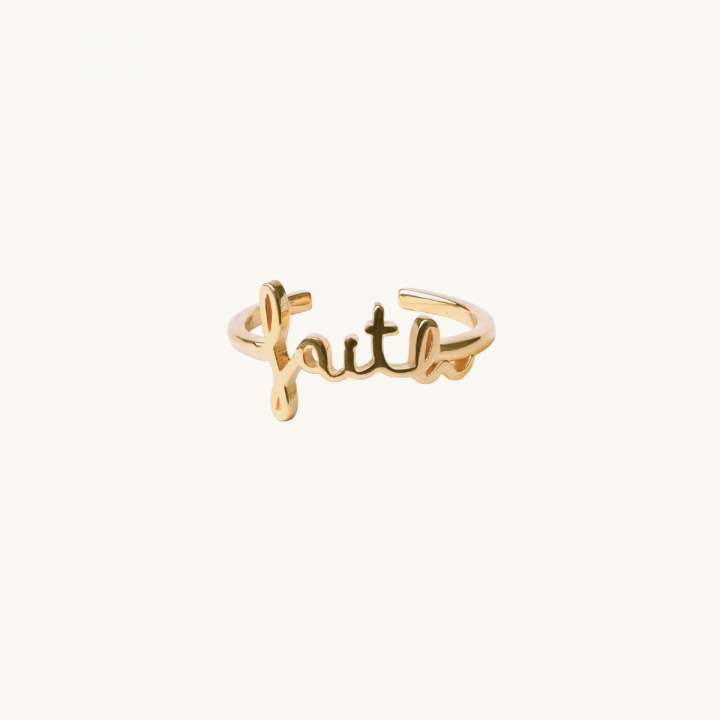 Ring i guld med ordet faith